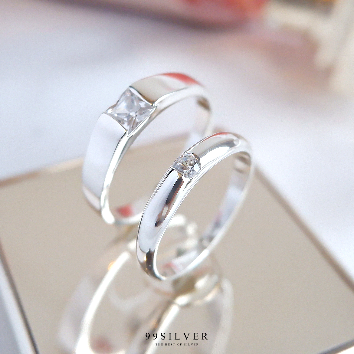 แหวนคู่รัก เพชรเม็ดเหลี่ยม Diamond Cut และเพชรเม็ดเกลม 2.5 มิลลิเมตร เรือนโค้ง