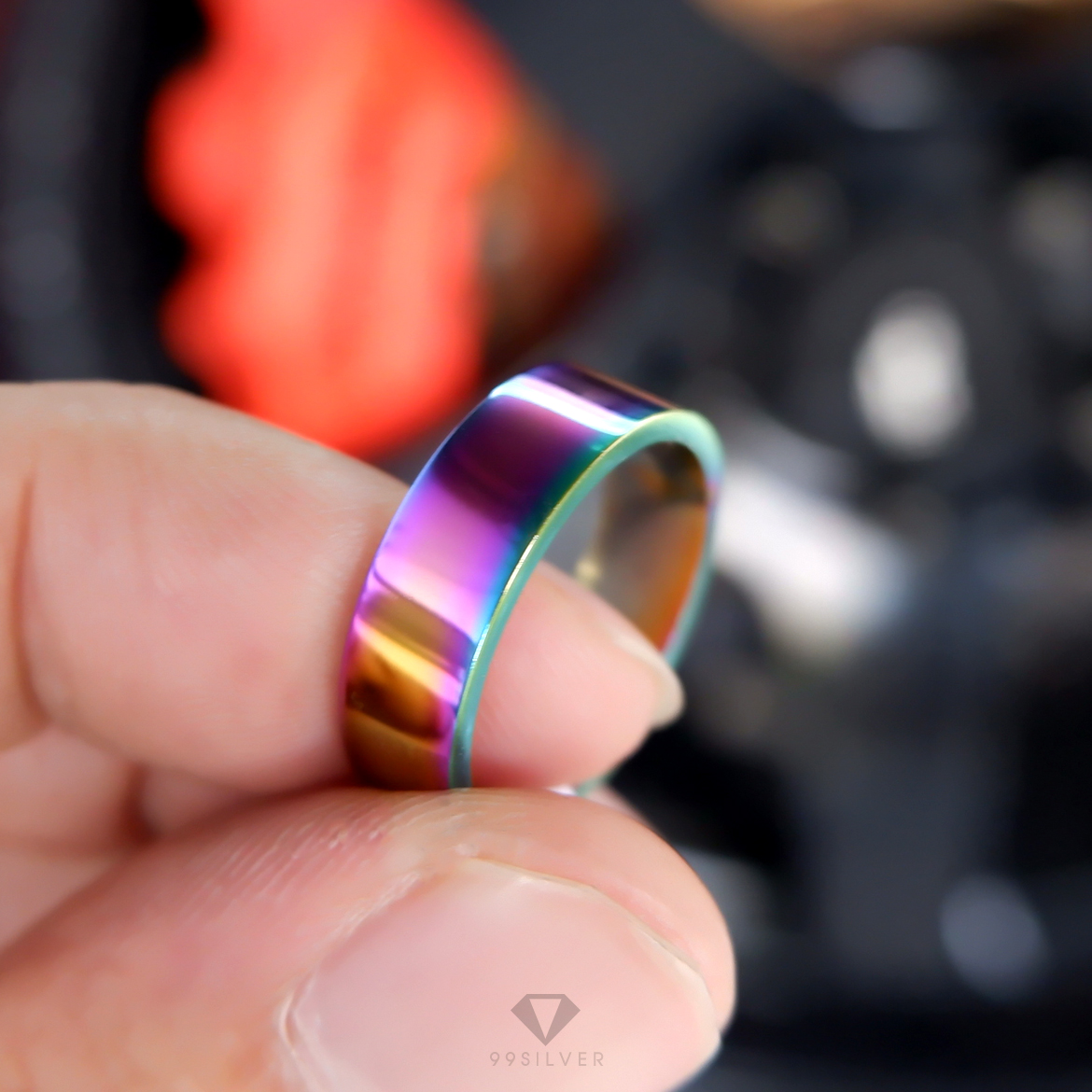 แหวนสแตนเลสไทเทเนี่ยมแท้ หน้ากว้าง 6 มิลลิเเมตร ผิวเงาเรียบ ไดร์ฟสีรุ้งไทเท